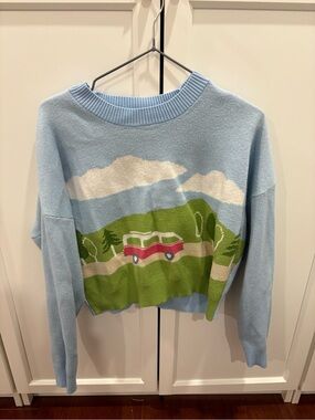 Light Blue Scenic Crewneck Sweater with Red Car Motif